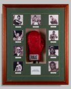 An autographed Everlast boxing glove, bearing nine World's Greatest heavyweight boxers