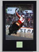 Barry Sheene iconic autographed print giving the V sign.