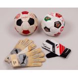 Two Manchester United autographed footballs