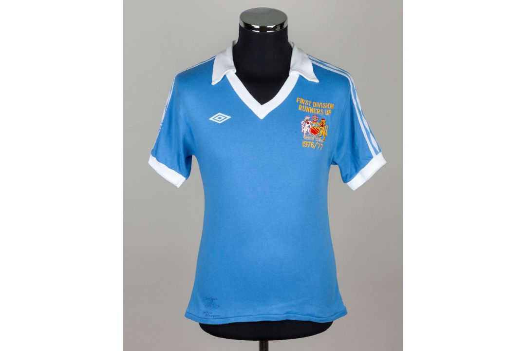 Sky-blue and white No.11 Manchester City match worn short-sleeved shirt, 1977-78 - Image 1 of 4