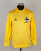 Sammy McIlroy yellow No.17 Northern Ireland v. Austria match worn keepers shirt, 1982