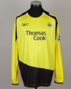 Andy Cole yellow and black No.9 Manchester City match worn long-sleeved shirt, 2005-06