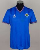 Sammy McIlroy blue No.4 Linfield v. Manchester United match worn shirt, 1980s