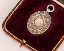 Tommy Taylor silver-gilt Inter-league Medal, 1956 in original fitted case