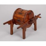 An extremely rare oak tennis ball cleaner by Sugden and Wilson, Leeds