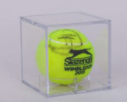An autographed Novak Djokovic Wimbledon tennis ball, 2015