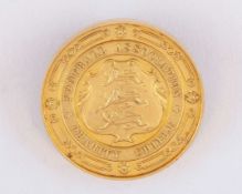Joseph Dines a yellow-metal Charity Shield medal&nbsp;