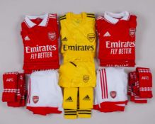 Sixteen red and white Arsenal short-sleeved shirts, 2022-23