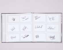 A large folder of golf autographs on card
