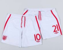Two pairs of England Euro qualifiers match issued shorts, 2012