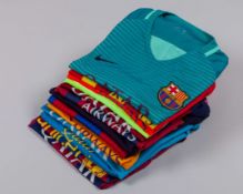 Thirteen various Barcelona shirts