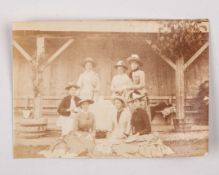 Period Victorian photograph of lady tennis players taking tea