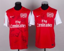 Two red and white Arsenal autographed short-sleeved shirts