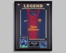 A Lionel Messi autographed garnet and blue Barcelona replica shirt display
