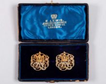 A cased pair of 1886 Sandown Park members' badges