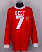A red replica No.7 autographed George Best shirt