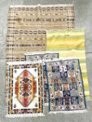 A GROUP OF 5 RUGS TO INCLUDE WOOL EXAMPLES.