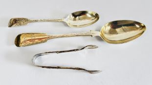 AN ANTIQUE SILVER SPOON EDINBURGH ASSAY MAKER J.P.G. L 23CM + ONE OTHER AND A PAIR OF SILVER TONGS.