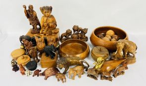 A GROUP OF CARVINGS TO INCLUDE ETHNIC HARDWOOD LION, VARIOUS FIGURES,