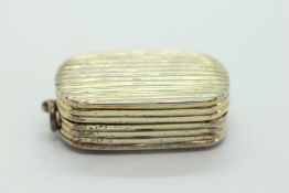 AN ANTIQUE SILVER GILT PENDANT VINAIGRETTE WITH GILT INTERIOR, LONDON 1801, MAKER T.R. 3.2 X 1.