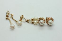 A PAIR OF ELABORATE OPEN WORK PEARL STUD EARRINGS (RUBBED MARKS) + TWO PAIRS OF YELLOW METAL PEARL