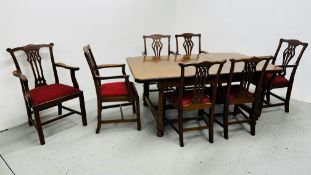AN OAK EXTENDING DINING TABLE ON HEAVY TURNED LEGS 178 X 175CM ALONG WITH FOUR PLUS THREE DINING