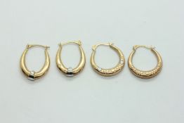 TWO PAIRS OF 9CT GOLD HOOP EARRINGS.