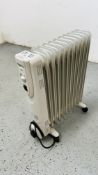 A KINGFISHER OIL FILLED ELECTRIC RADIATOR - SOLD AS SEEN.