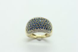 9CT GOLD MULTI STONE DRESS RING.