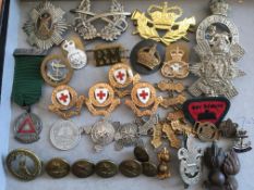 MILITARIA: TUB OF MILITARY, RED CROSS, SCOUTING AND OTHER BADGES, DRIVING MEDAL, FEW BUTTONS, ETC,