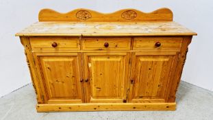 A SOLID NATURAL PINE THREE DRAWER,