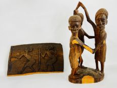 AN ETHNIC TRIBAL HARD WOOD CARVED PANEL L 33 X H 20CM + A FURTHER CARVED SCULPTURE DEPICTING A