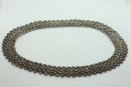 A SILVER AND MARCASITE COLLAR NECKLACE OF MULTI NAVETTE SHAPED DESIGN.