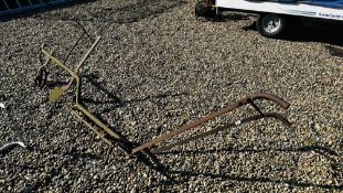 ANTIQUE CAST METAL HOE.