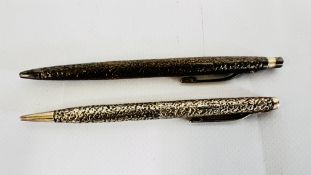 A VINTAGE SILVER BALL POINT PEN, BIRMINGHAM ASSAY, MAKER SJR ALONG WITH A MATCHING PENCIL.