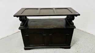 A REPRODUCTION MONKS SEAT W 96CM D 42CM H 75CM.