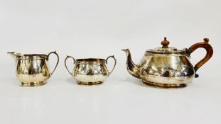 AN IMPRESSIVE SOLID SILVER THREE PIECE TEASET, LONDON 1979 MAKER E.B.