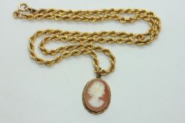 A 9CT GOLD ROPE TWIST NECKLACE SUPPORTING AN OVAL CAMEO PENDANT L 46CM.