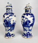 A PAIR OF QIANLONG BLUE AND WHITE BALUSTER SHAPED VASES AND COVER (EXTENSIVE DAMAGE TO NECK AND
