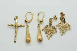 A PAIR OF 9CT GOLD DROP EARRINGS, A PAIR OF YELLOW METAL LEAF DESIGN EARRINGS AND A 9CT GOLD CROSS.