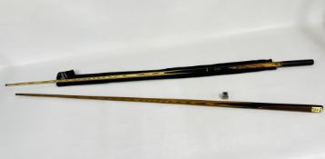 A SNOOKER CUE MARKED 