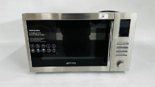 SMEG STAINLESS STEEL MICROWAVE OVEN - SOLD AS SEEN.