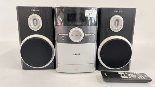 A PHILLIPS MICRO HIFI SYSTEM MODEL MC147 WITH REMOTE - SOLD AS SEEN.