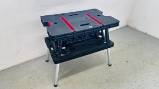 A KETER COLLAPSIBLE FOLDING WORK BENCH.