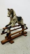 A C20th ROCKING HORSE (LOSSES TO SURFACE), SOME REDECORATION, LENGTH OF STAND 136CM.