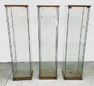 THREE GLAZED DISPLAY CABINETS W 42.5CM D 36.5CM H 167CM.