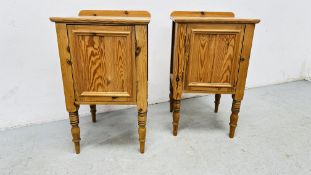 A PAIR OF PINE WAXED FINISH SINGLE DOOR BEDSIDE CABINETS.