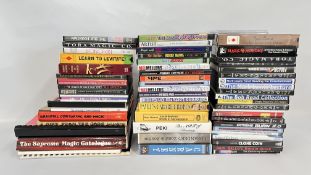 BOX CONTAINING COLLECTION OF MAGIC DVD'S AND VIDEOS APPROX 50 TITLES PLUS GROUP OF MAGICIANS BOOKS.