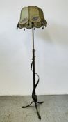 A BRASS TRIPOD TELESCOPIC STANDARD LAMP, NOW WITH 1930s BEADED SHADE WITH INTWINED COLUMN,