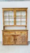 AN ANTIQUE STRIPPED AND WAXED C19th PINE DRESSER,